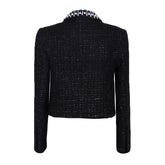 Kurzer Tweed-Blazer mit Schmucksteinen an den Schulterpolstern, langen Ärmeln und Schalkragen